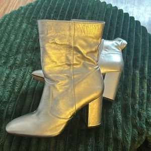 Jessica Simpson silver high heel booties, worn but very little wear and tear.